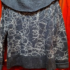 Boiled wool sweater with embroidery detailing.